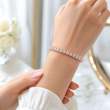 Bracelet tennis serti clos taille émeraude