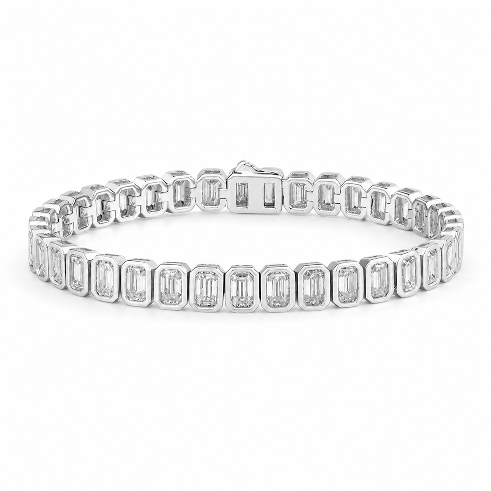 Bracelet tennis serti clos taille émeraude